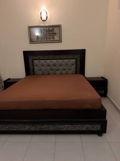 King bed with side tables and dressing