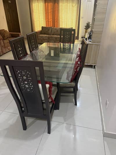 Dinning Table with 6 chairs and cushions