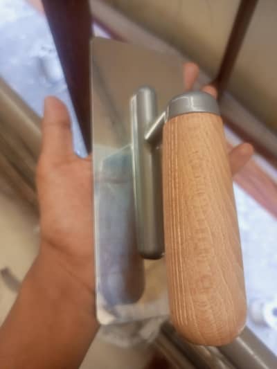 wooden handle steel trowel