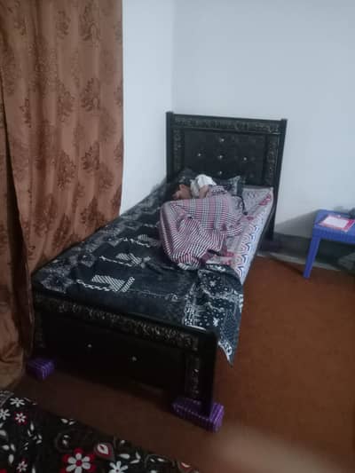 I am selling iron single bed with matress decent condition