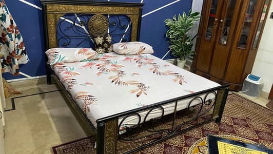 Iron double bed with mattress