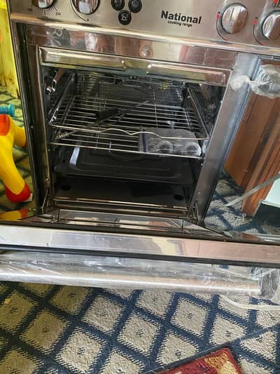 5 standard burner . Gess baking oven , grey colour