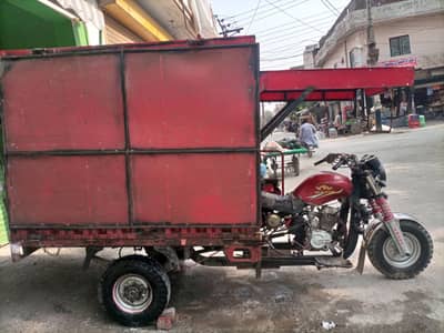 Loader rickshaw with fiber body and shade.