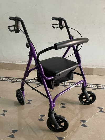 Rollator/ Walker with seat and brakes. UK import