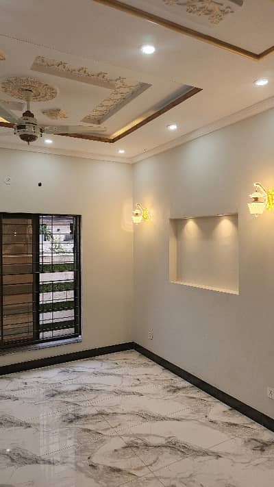5 Marla Brand New Full House with 5 bedrooms attach bathrooms, Triple Kitchen, Triple Tv Lounge, Woodwork,tile flooring everything done Available For Rent in the most Precious Society of Raiwind Road Lahore Etihad Town Phase 1.