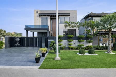 Elegant One Kanal Premium Quality Constructed Modern Luxury Bungalow Available For Sale In Phase 7 Prime Location With Outstanding Architecture And High-End Finishing.