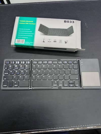 Foldable Bluetooth keyboard with tuch pad B033 Portibal Stylish