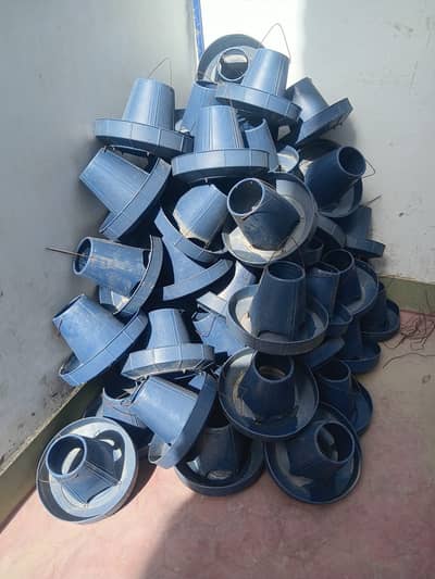 Poultry feeding pans