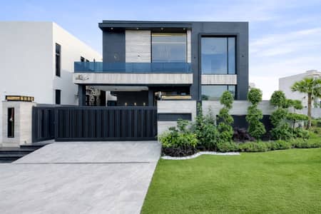 Experience the pinnacle of luxury! One Kanal, brand new modern bungalow in DHA Phase 7 with top-notch design, premium finishes, and direct prime access a must-see masterpiece!