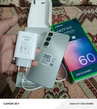 infinix hot 60i complete box just 5 month use  7 month warranty
