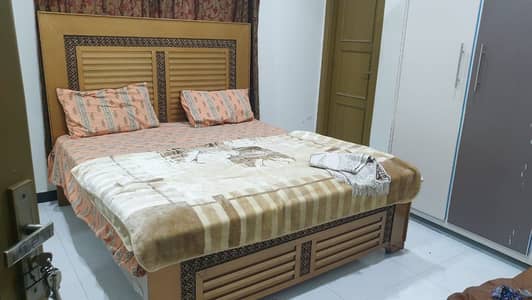 King size bed with side tables and dressing