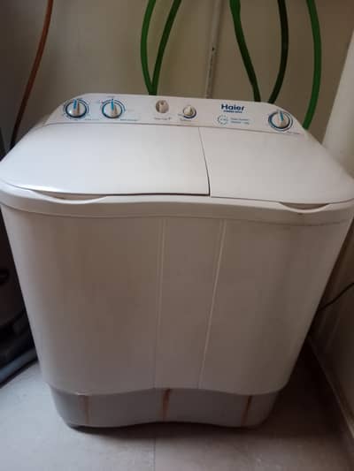 Haier watching machine and dry