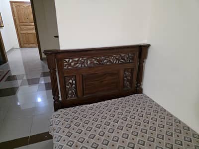 solid shesham wood bed