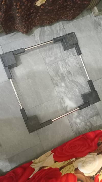 A adjustable fridge stand