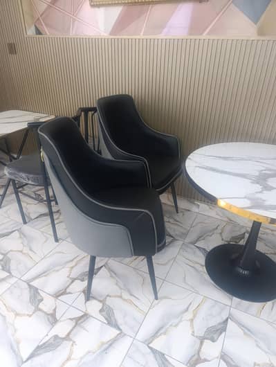 Almost new chairs and table for  sale 22 chairs 7 table
