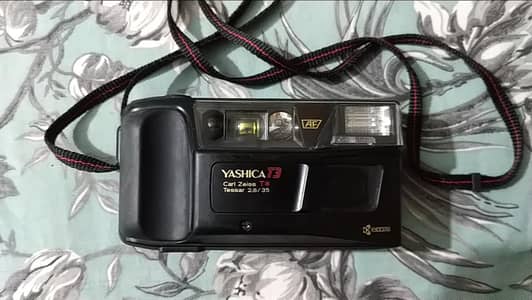 yashica T3-yashica electro 35-canon shoreshot-nikon-konica pop-pentax