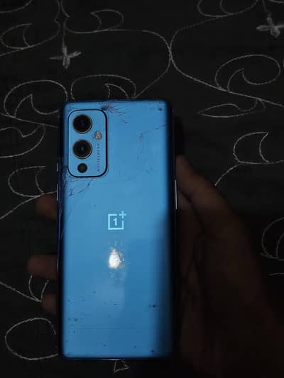 One Plus 9 online pta approved 2 line hain back crack ha
