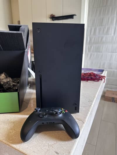 Xbox One X 1 TB (almost new)