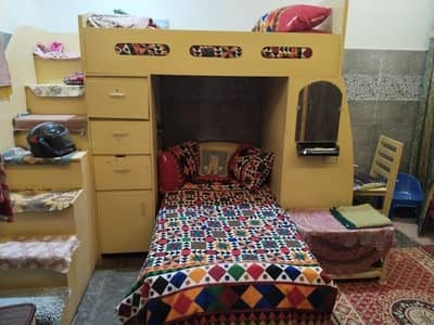 2single beds stairs reeding table and chair