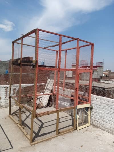 wooden cage,size hight 9 feet. ,right left,6×6.