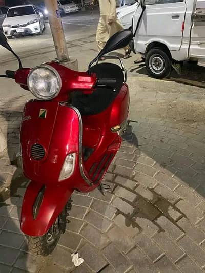 Ramza petrol scooter 100cc cherry red color