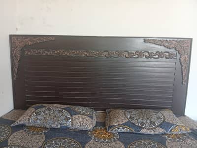 double bed with foam mattress. . . .