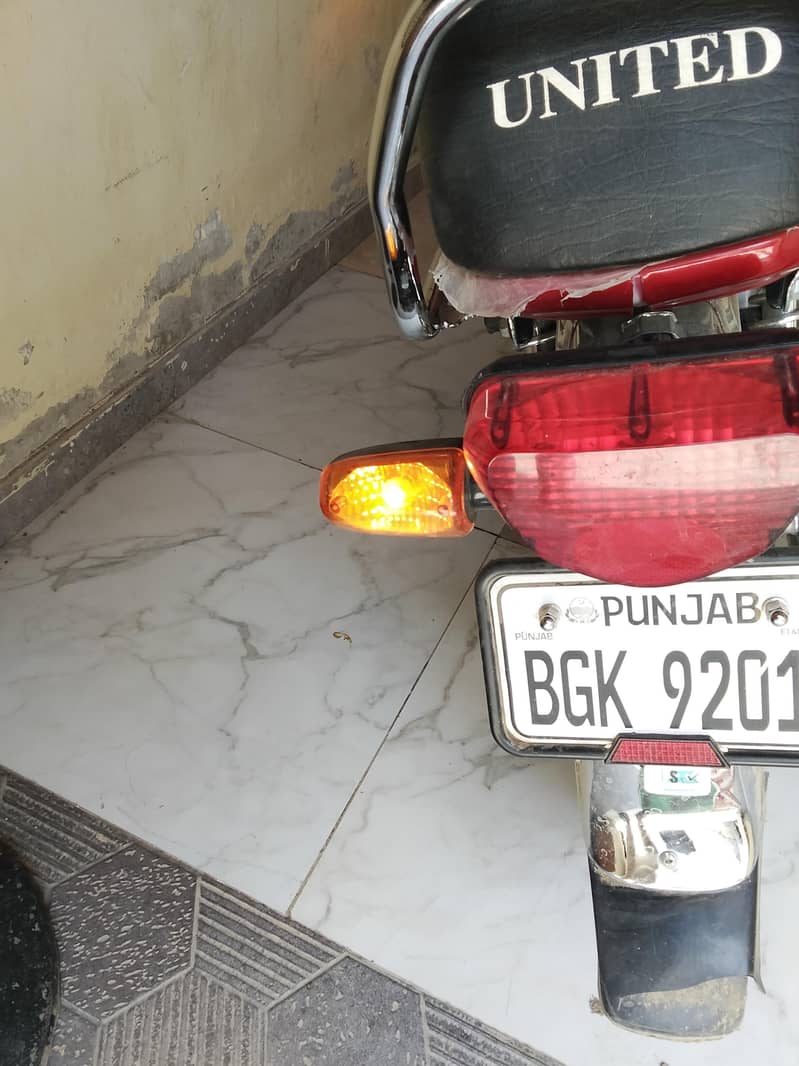 united 70cc 6