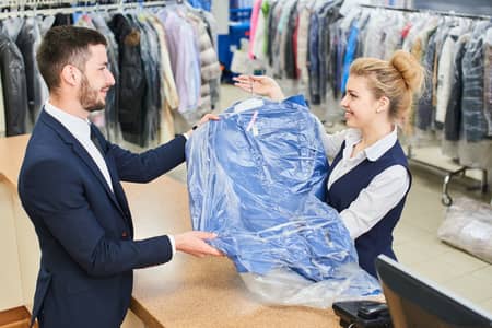 Dry cleaners shop counter dealing