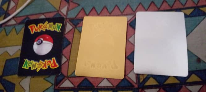 GOLDEN AND SILVER AND BLACK POKEMON CARDS