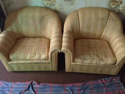 2 single seater sofa with covers fixed price