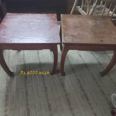 Wooden tables and plastic chairs