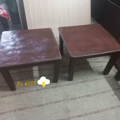 Wooden tables and plastic chairs