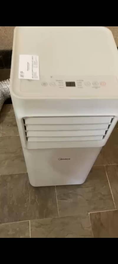 new condition 0.75 Ton midea  potable AC inverter