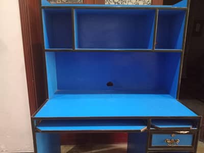 It is a nice computer table with is made of hard plywood