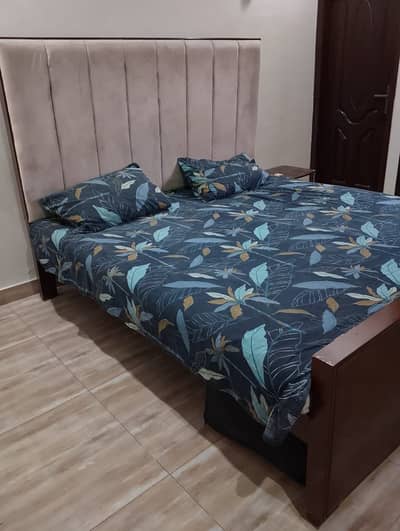 Bed with sidetables