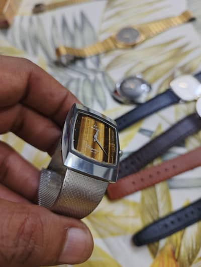 Rado mens watch with tiger eye dial