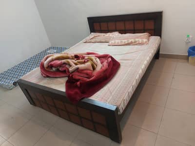 Double bed with mattress in perfect condition