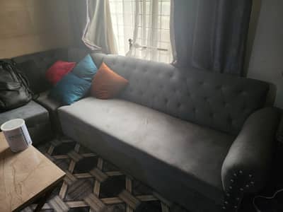 L shape 7 seather grey color sofa with cushions
