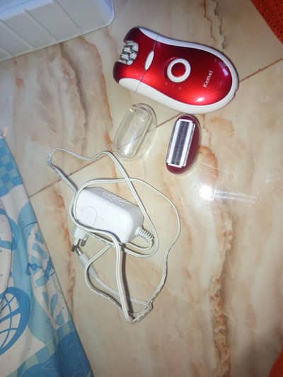 two hair removal +shaving machines