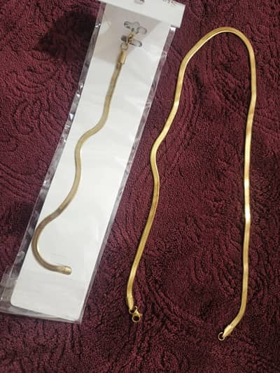 beautiful golden chain and bracelet.
