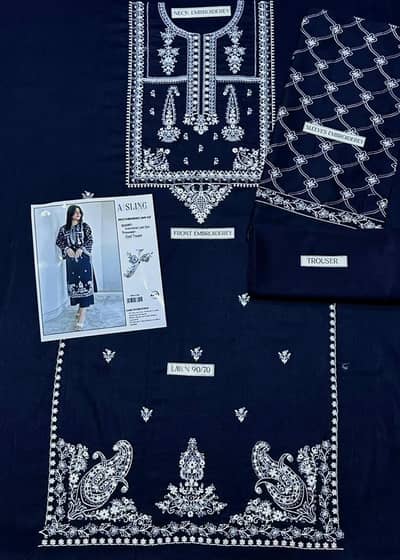 woman's Blue embroided lawn suit with white details