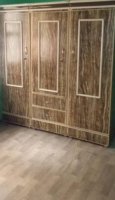 3 door cupboard good condition wooden