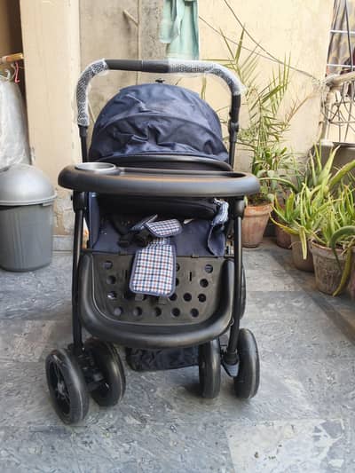 Comfortable Baby Pram / Stroller with Food Tray & Safety Harness
