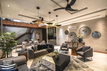 MAZHAR MUNIR DESIGN 1-KANAL BRAND NEW ELEGANT AND FULLY LOADED SUPER HOT LOCATED BUNGALOW IS AVAILABLE IN THE BEST BLOCK OF DHA LAHORE.