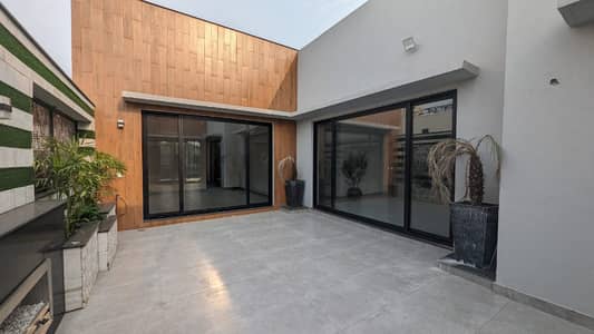PRIME LOCATION 1-KANAL ELEGANT AND SUPER HOT LOCATED BUNGALOW IS AVAILABLE IN THE BEST BLOCK OF DHA LAHORE