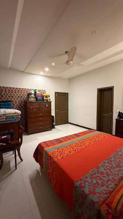 SPANISH DESIGN 1-KANAL ELEGANT AND FULLY MAINTAINED SUPER HOT LOCATED BUNGALOW IS AVAILABLE IN THE BEST BLOCK OF DHA LAHORE.