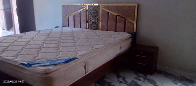 new bed with 2 side tables