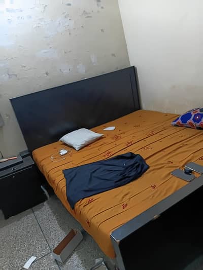 Double bed with sides table