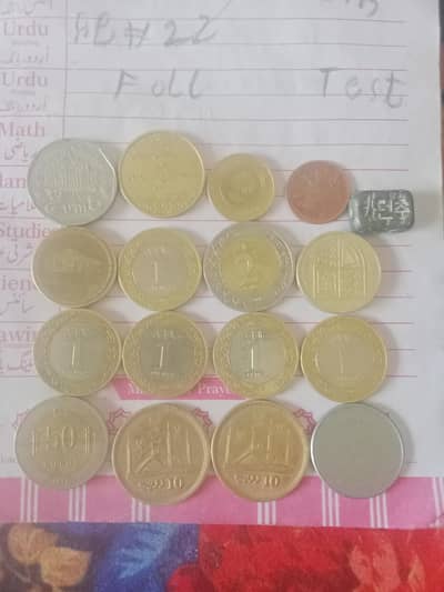 mixed coins. Saudi Pakistani, pound and others