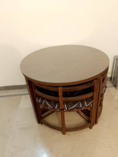 Four chaired round dinning table